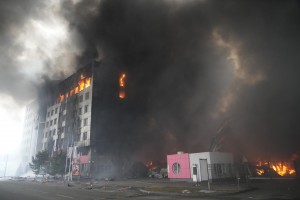 A building burns after shelling in Kyiv, Ukraine, Thursday, March 3, 2022. Russian forces have escalated their attacks on crowded cities in what Ukraine's leader called a blatant campaign of terror. (AP Photo/Efrem Lukatsky) Times of Israel.